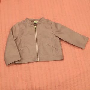 Blush jacket with gold zipper